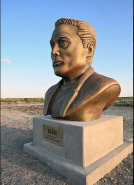 Starbase: A cidade espacial de Elon Musk vira realidade no Texas cabeca de bronze de Musk